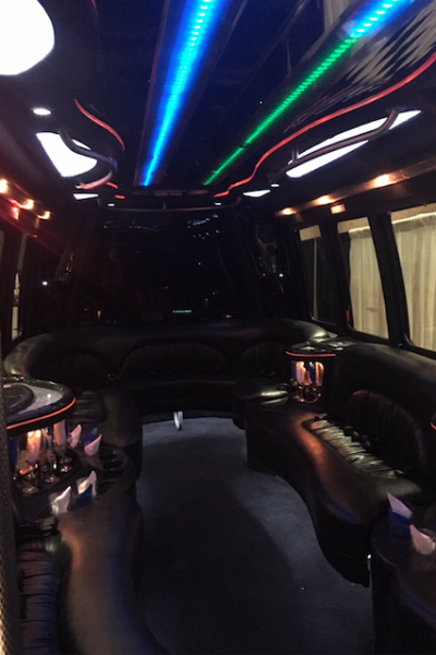 Screen Shot 2019-05-23 at 11.15.43 AM the poutside of a black party bus